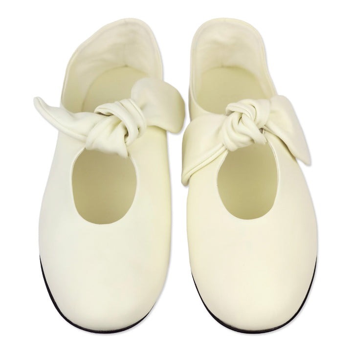 CO Ivory Nappa Leather Bow Flats