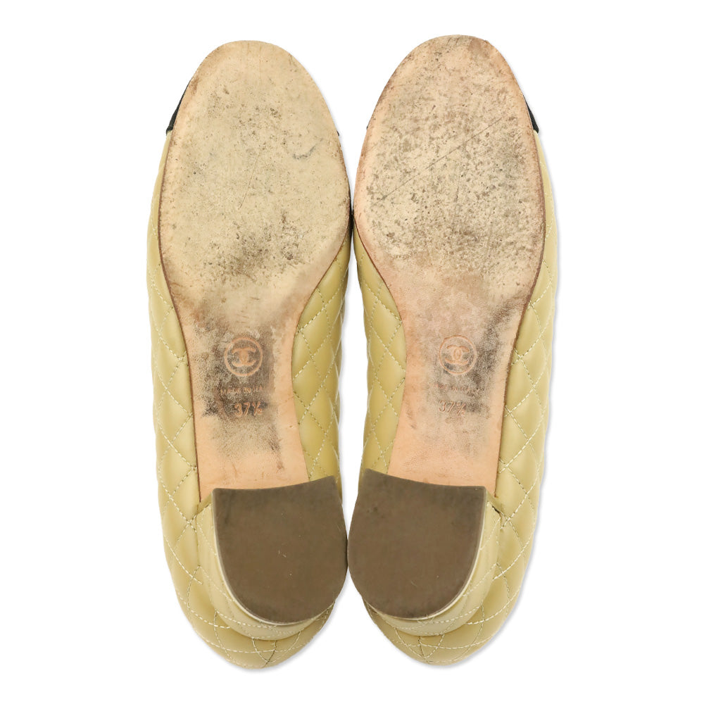 Chanel Beige Lambskin Quilted Black Cap Toe Gold Heel Pump