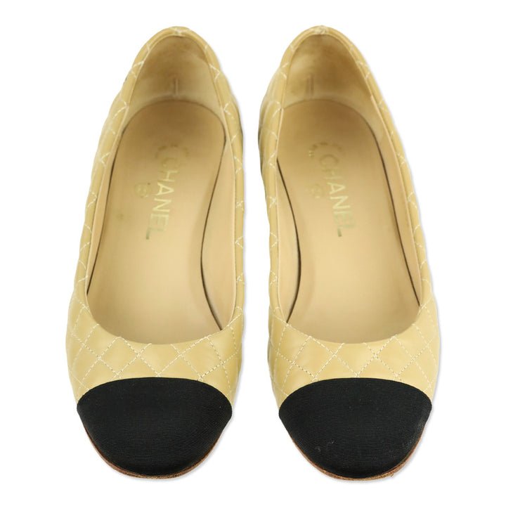 Chanel Beige Lambskin Quilted Black Cap Toe Gold Heel Pump