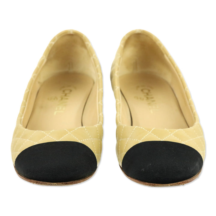 Chanel Beige Lambskin Quilted Black Cap Toe Gold Heel Pump