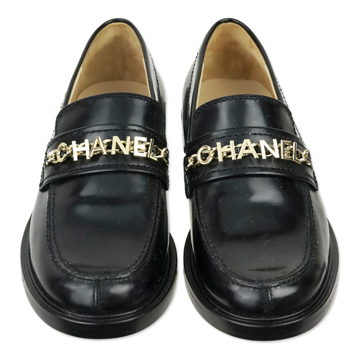 Chanel Black Leather Logo Charm Chain Loafers