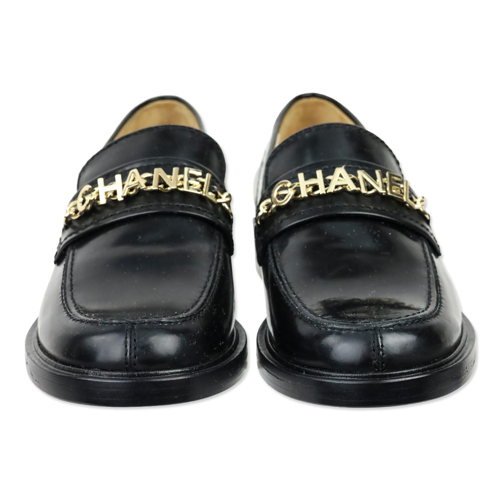 Chanel Black Leather Logo Charm Chain Loafers