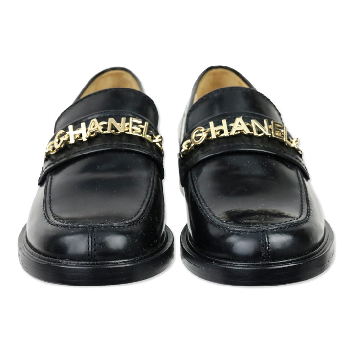 Chanel Black Leather Logo Charm Chain Loafers