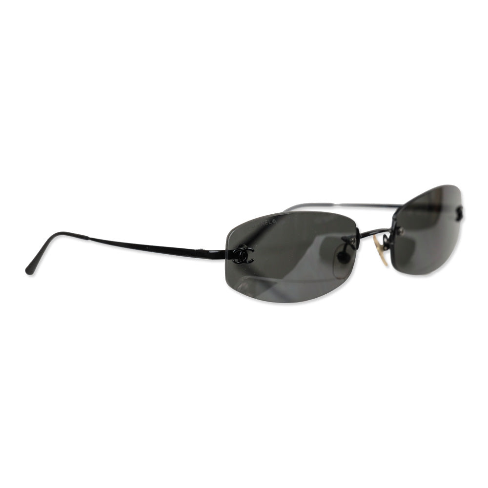 Chanel Black Rimless Blue Tinted Oval Sunglasses