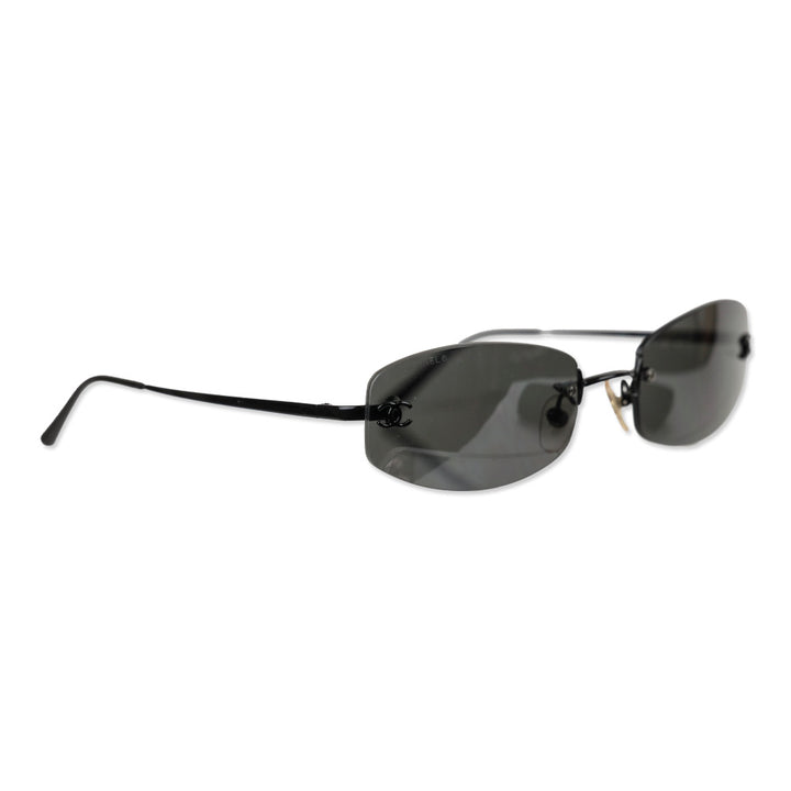 Chanel Black Rimless Blue Tinted Oval Sunglasses