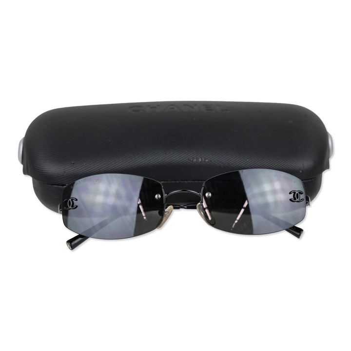 Chanel Black Rimless Blue Tinted Oval Sunglasses