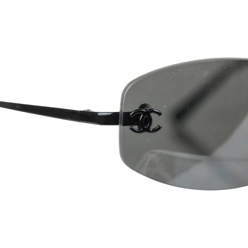 Chanel Black Rimless Blue Tinted Oval Sunglasses