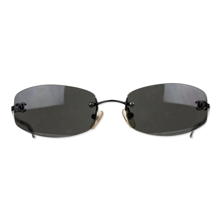 Chanel Black Rimless Blue Tinted Oval Sunglasses