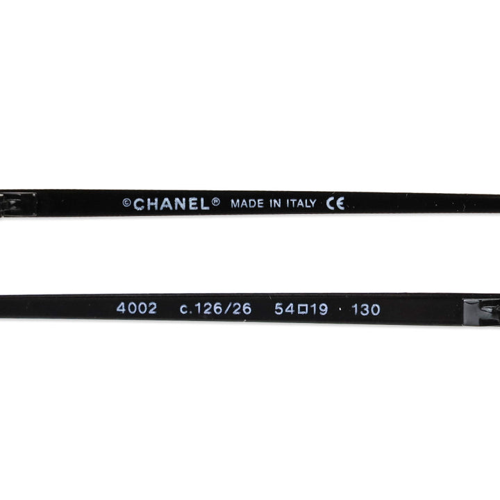 Chanel Black Rimless Blue Tinted Oval Sunglasses