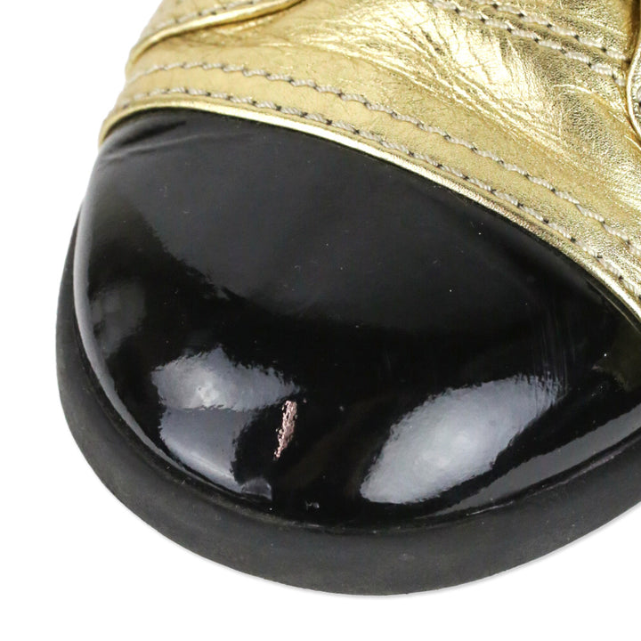 Chanel Metallic Gold Leather/Black Patent Cap Toe Lace-Up Sneakers