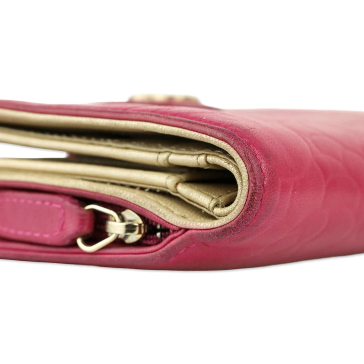 Chanel Pink Lambskin Camellia Embossed L-Zip Wallet