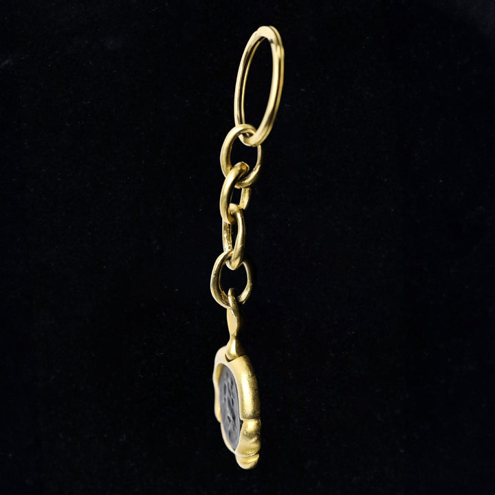 Donna Karan Black Intaglio Cherub Gold Tone Key Chain