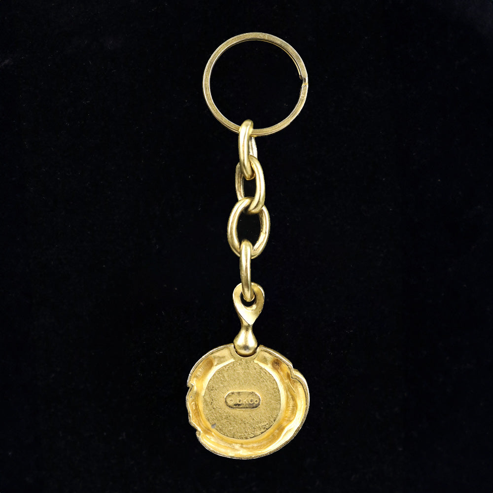 Donna Karan Black Intaglio Cherub Gold Tone Key Chain