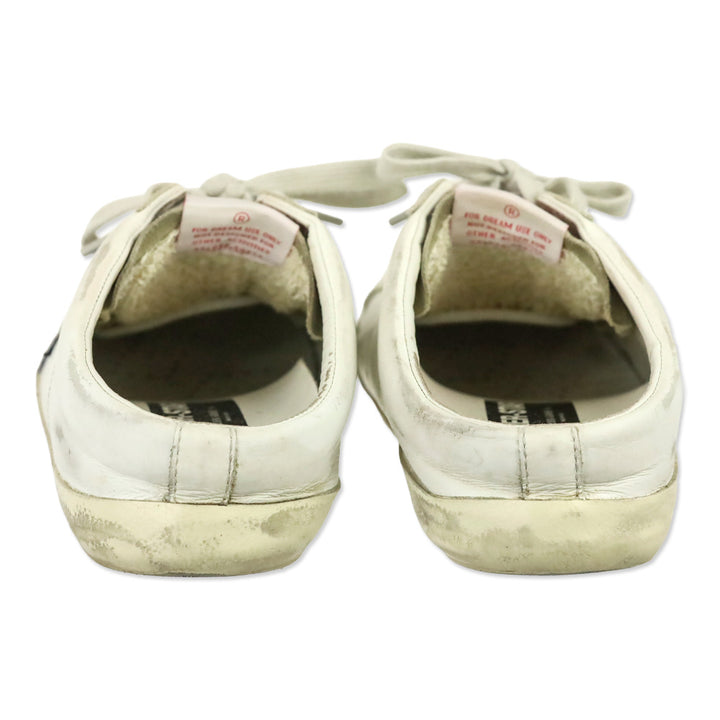 Golden Goose Super-Star Sabot with a Blue glitter star and suede tongue