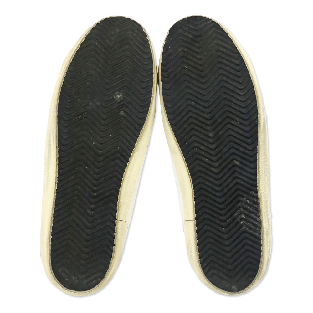 Golden Goose Super-Star Sabot with a Blue glitter star and suede tongue