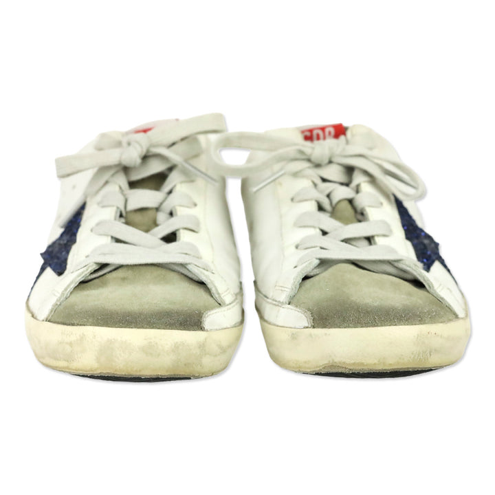 Golden Goose Super-Star Sabot with a Blue glitter star and suede tongue