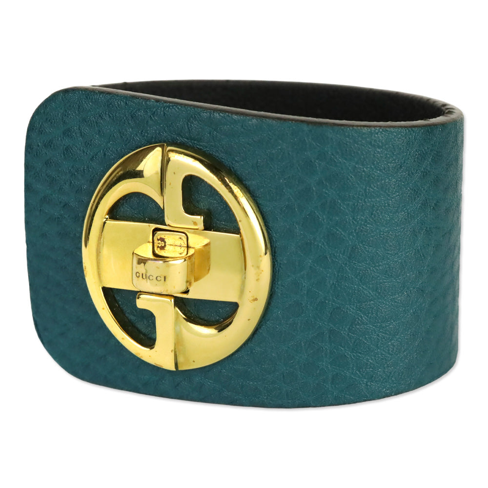 Gucci Gold Tone Turnkey GG Teal Embossed Leather Bracelet