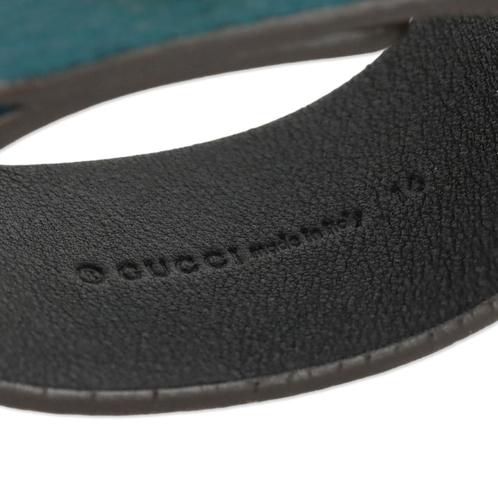 Gucci Gold Tone Turnkey GG Teal Embossed Leather Bracelet