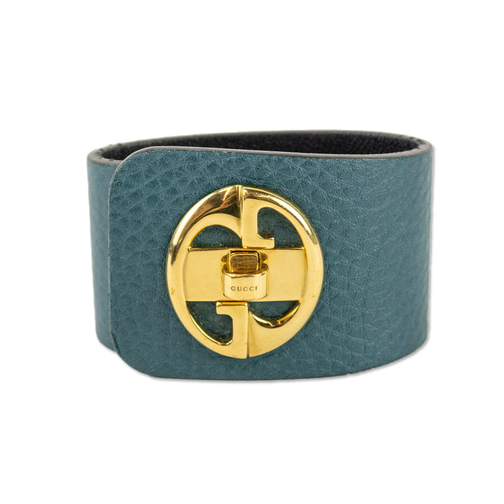 Gucci Gold Tone Turnkey GG Teal Embossed Leather Bracelet