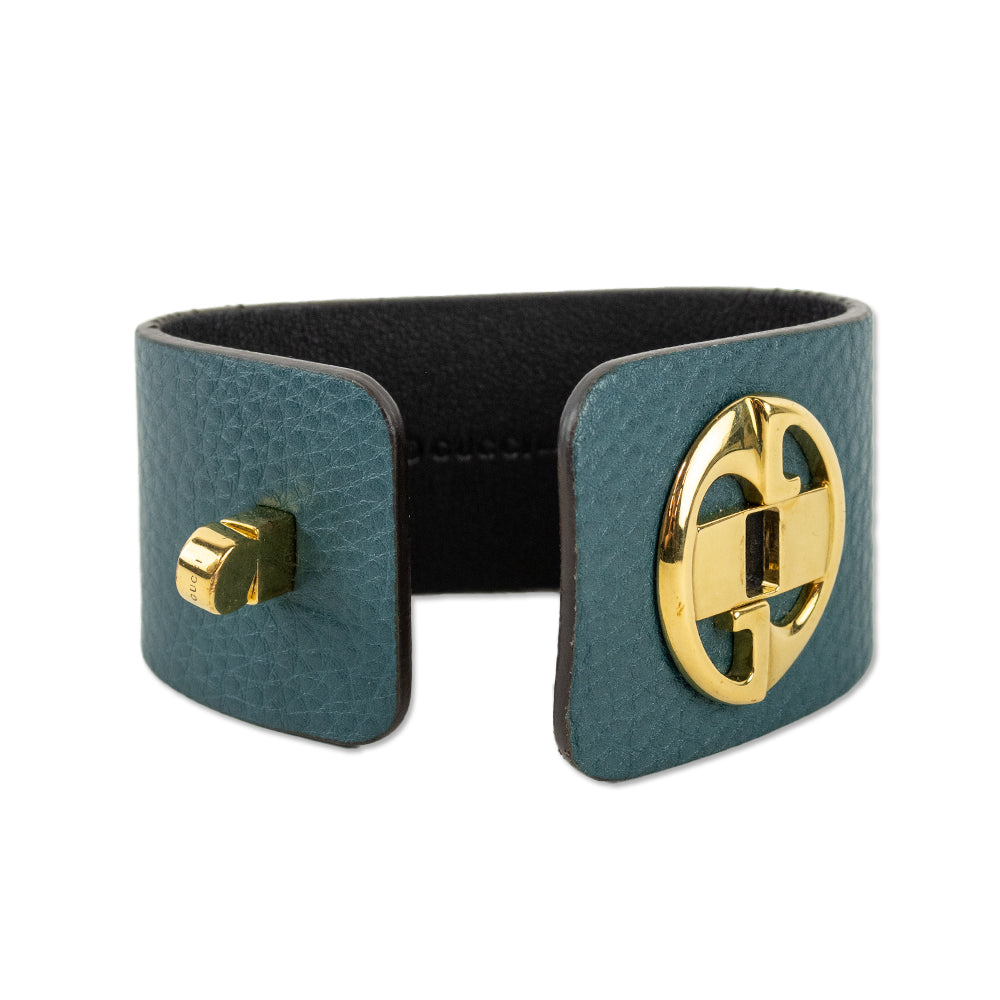 Gucci Gold Tone Turnkey GG Teal Embossed Leather Bracelet