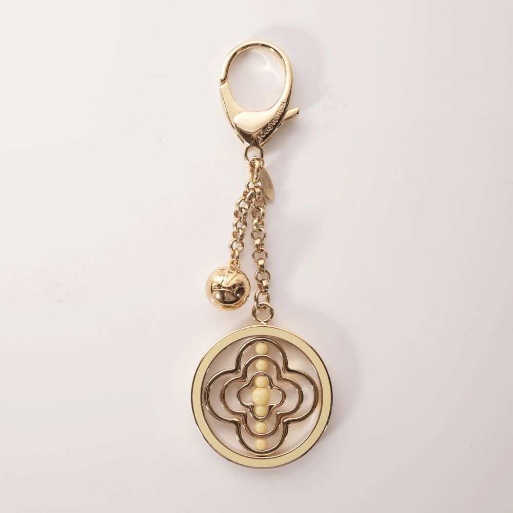 Louis Vuitton Gold & Cream Spinning Resin Key Chain Bag Charm
