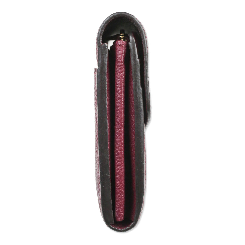 Louis Vuitton Raisin Monogram Empreinte Leather Sarah Wallet