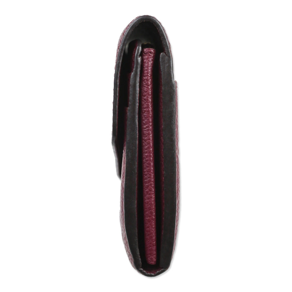 Louis Vuitton Raisin Monogram Empreinte Leather Sarah Wallet