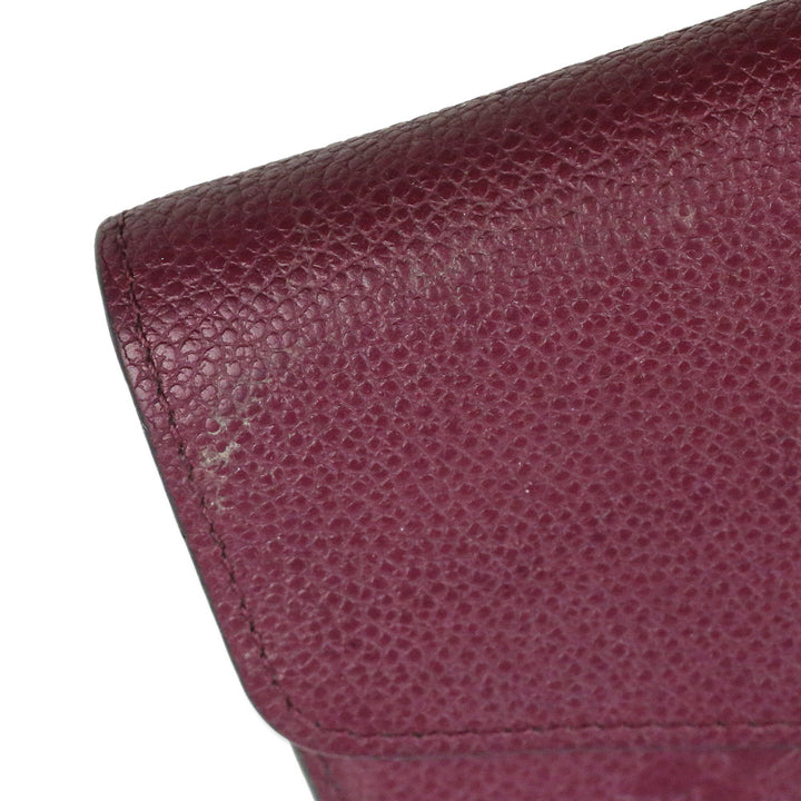 Louis Vuitton Raisin Monogram Empreinte Leather Sarah Wallet