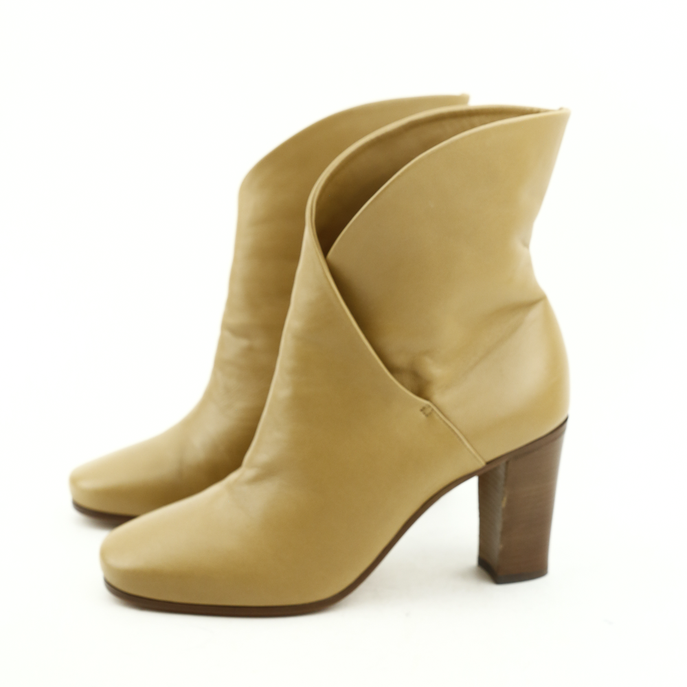 side view of Celine Camel Leather Mid-Calf Boots