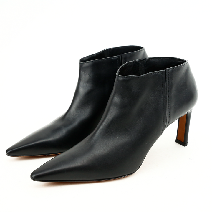 side view of Altuzarra Black Leather Hay Knee High Boots