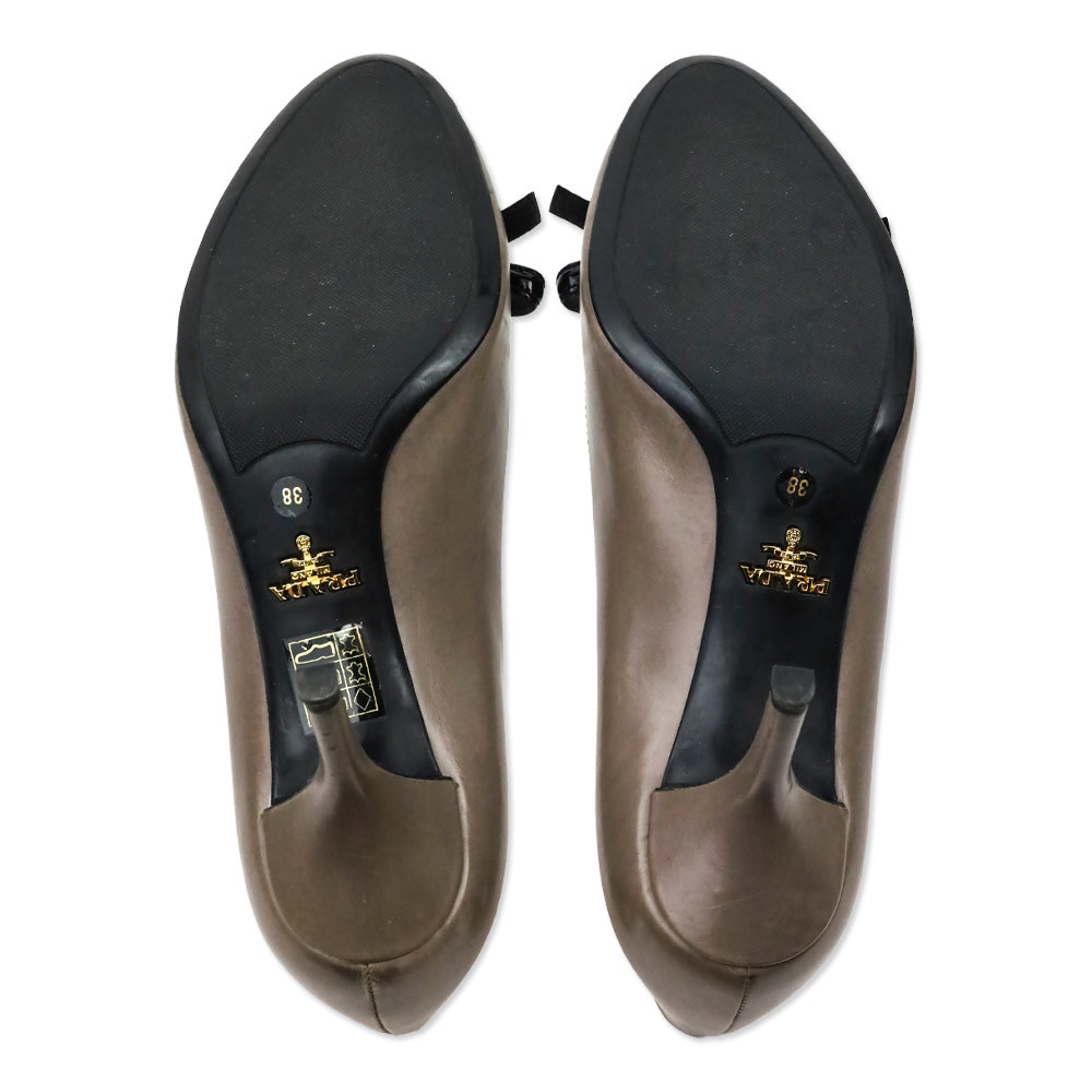 Prada Taupe Leather Black Patent Leather Bow Pumps
