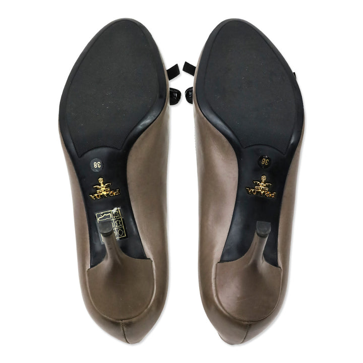 Prada Taupe Leather Black Patent Leather Bow Pumps