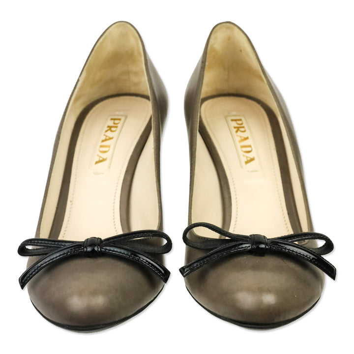 Prada Taupe Leather Black Patent Leather Bow Pumps