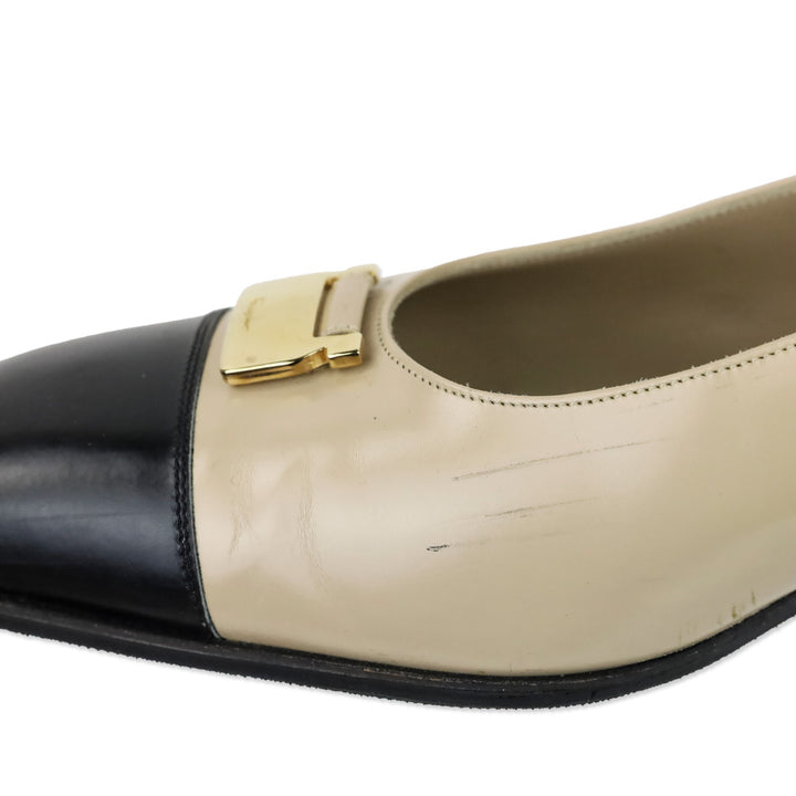 Salvatore Ferragamo Beige Leather Black Cap Toe Gold Accent Pumps