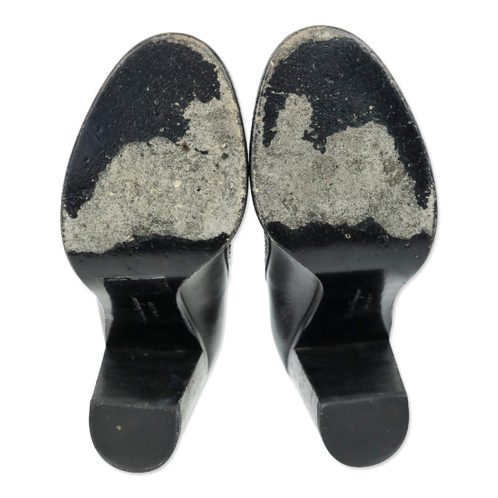 Salvatore Ferragamo Black Round Toe Gold Logo Accent Pumps