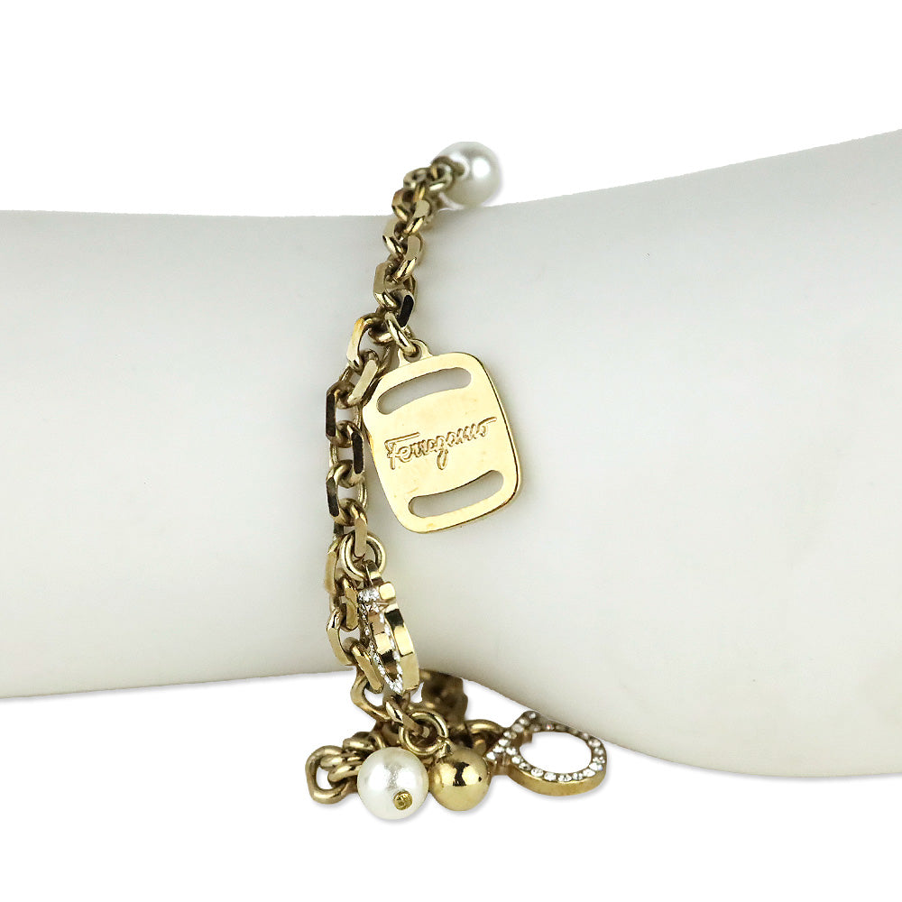 Salvatore Ferragamo Gold Tone Faux Pearl Crystal Gancini Chram Bracelet