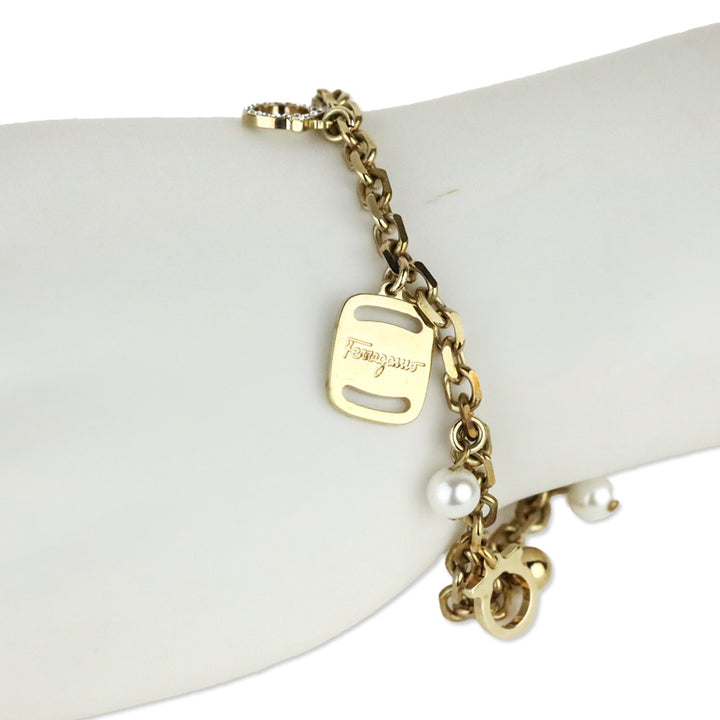 Salvatore Ferragamo Gold Tone Faux Pearl Crystal Gancini Chram Bracelet