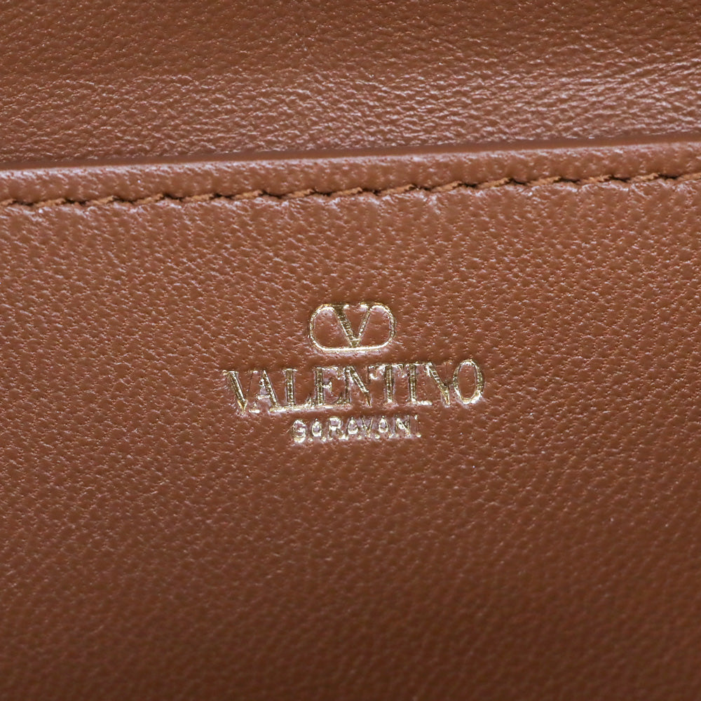 Valentino Garavani Metallic Gold Leather Mini Vlogo Pouf Bucket Bag