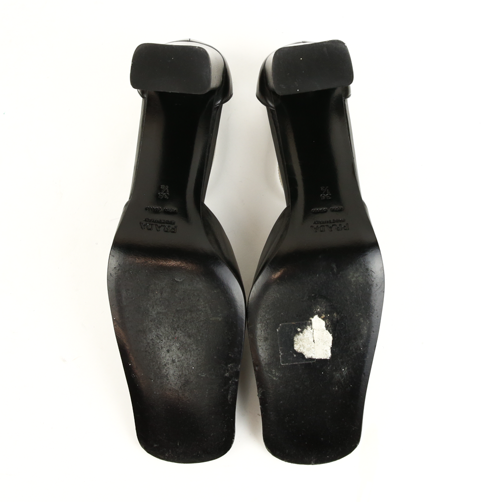 sole view of Prada Black Leather Vintage Square Toe Pumps
