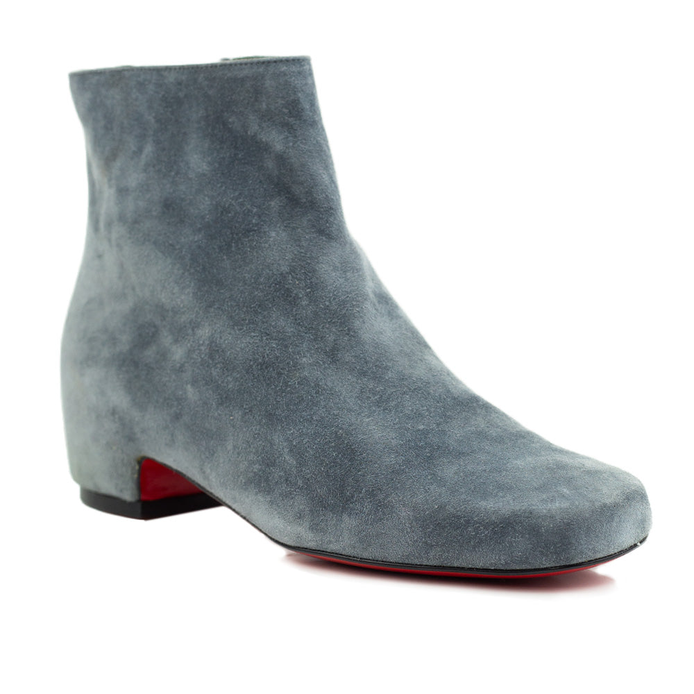 side view of Christian Louboutin Tounoir Booty Gray Suede Ankle Boots