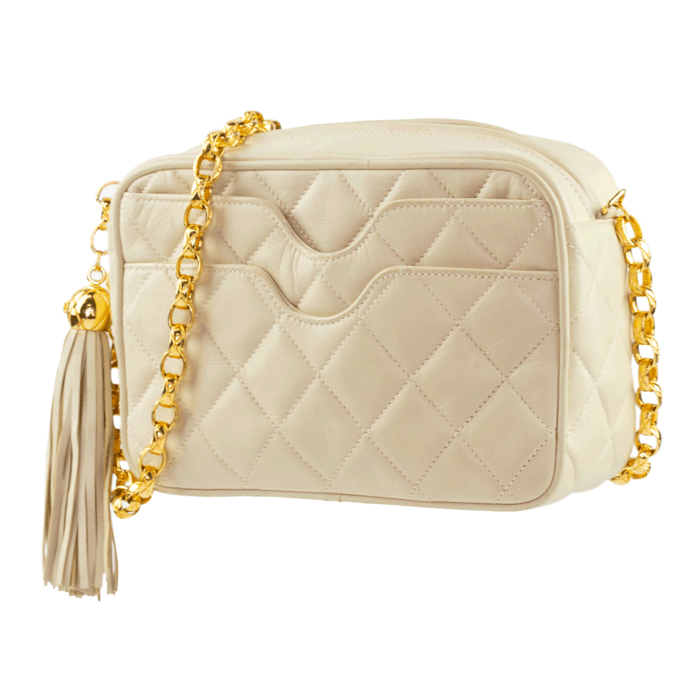 side view of Chanel Vintage Cream Quilted Leather Camera Bag