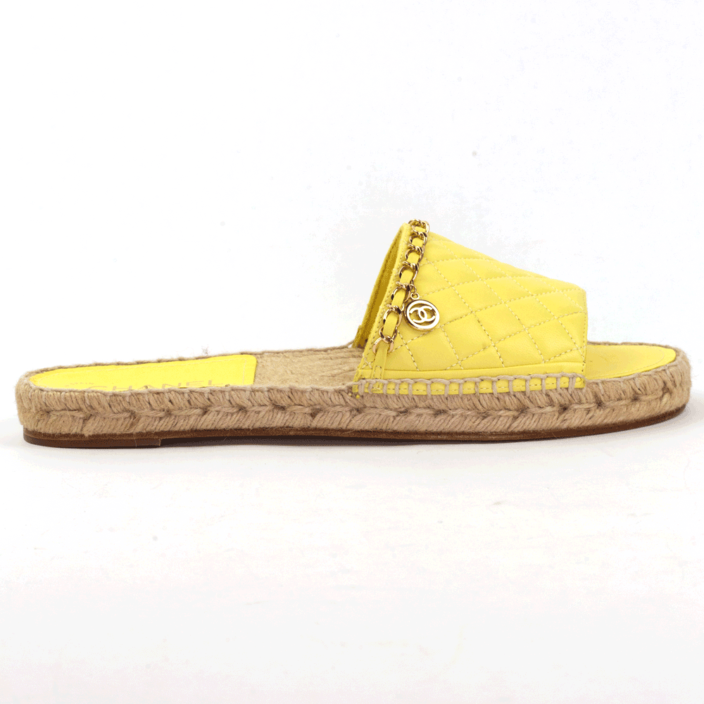 side view of Chanel Yellow Quilted Chain Espadrille Slide Sandals