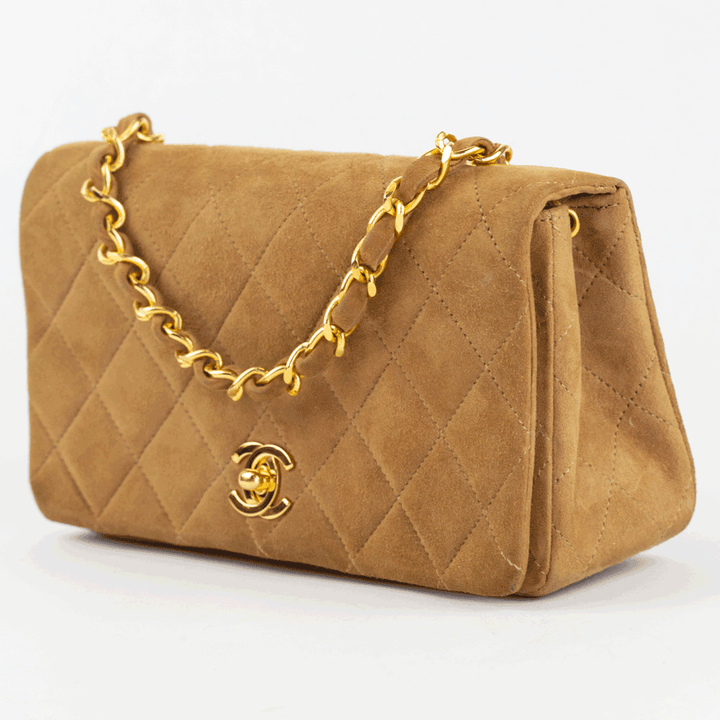 side view of Chanel Vintage Tan Suede Mini Flap Crossbody Bag