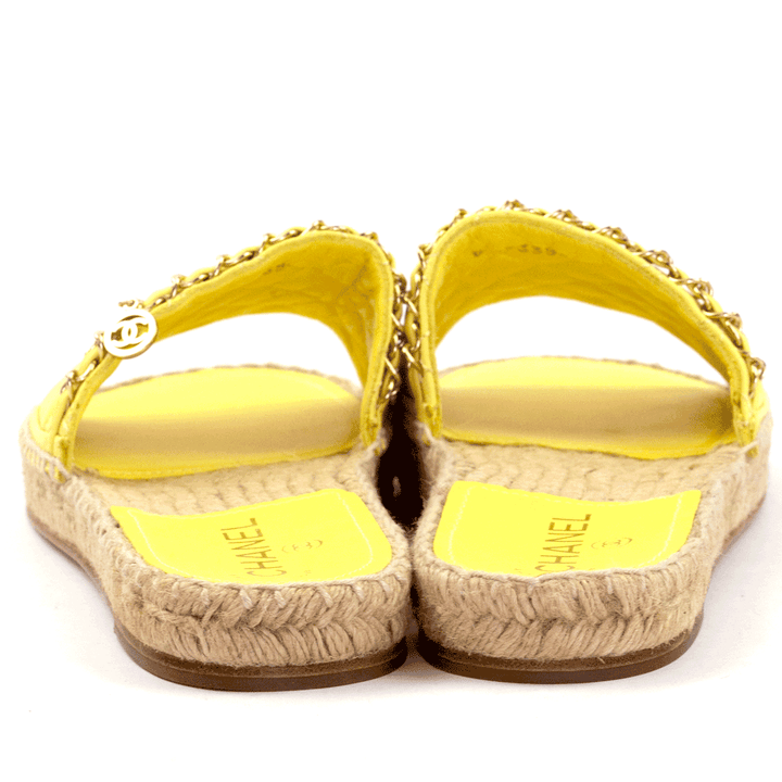 heel view of Chanel Yellow Quilted Chain Espadrille Slide Sandals