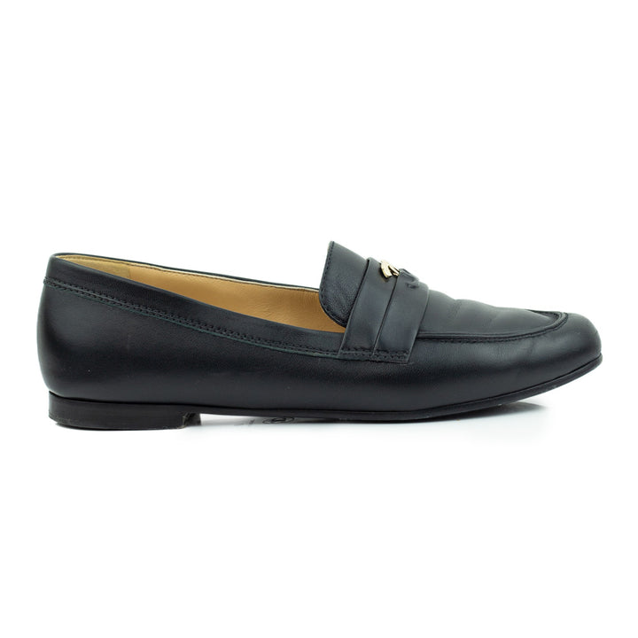 side view of Chanel Black Leather Interlocking CC Loafers