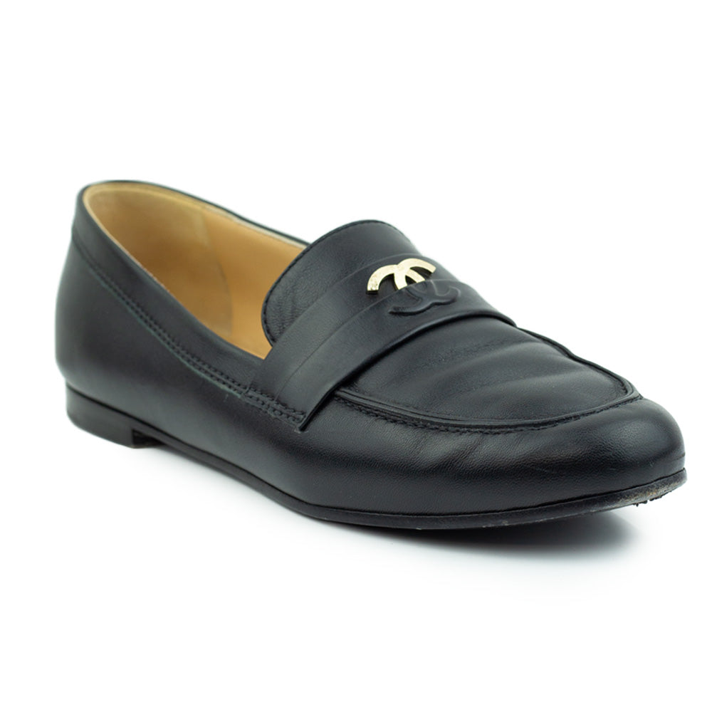 side view of Chanel Black Leather Interlocking CC Loafers