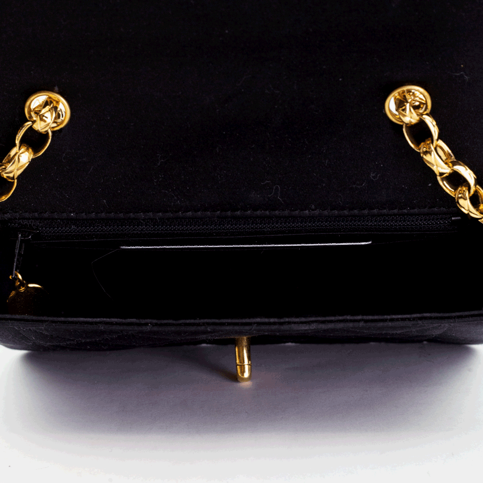 interior view of Chanel Vintage Black Satin Flap Crossbody Bag