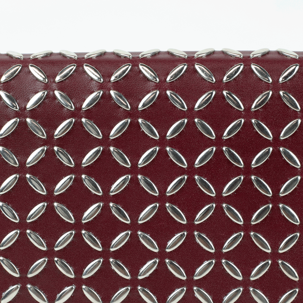 Alaia Red Leather Studded Clutch