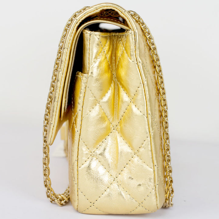 side view of Chanel Gold Reissue 227 Double Flap Bag