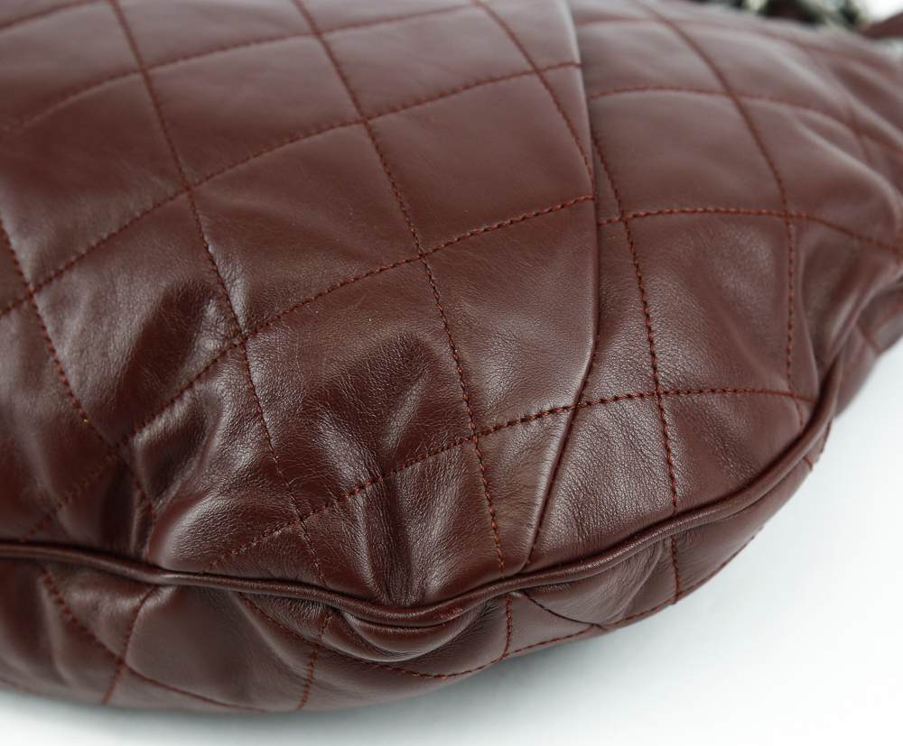 corner view of Chanel Coco Pleats Burgundy Leather Hobo Bag
